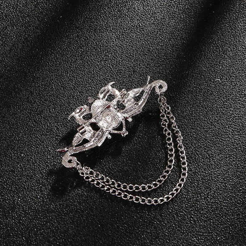 Broche à pampilles en cristal et dragon vintage pour homme