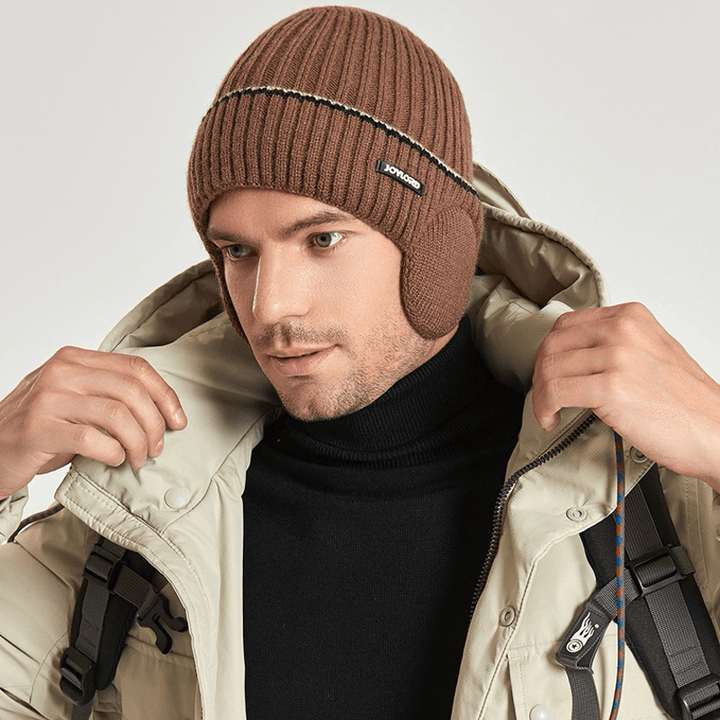 Bonnet unisexe en tricot épais et élastique avec cache-oreilles de couleur unie