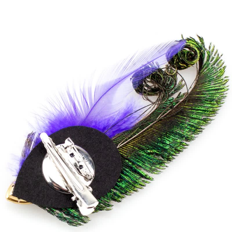 Broche en strass avec plumes d'oeil de paon