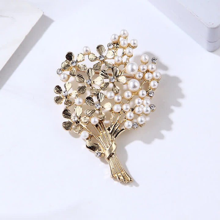 Broche pour femme en perles et fleurs dorées