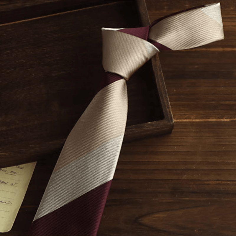 Cravate à rayures diagonales beige et bordeaux pour homme - image 1