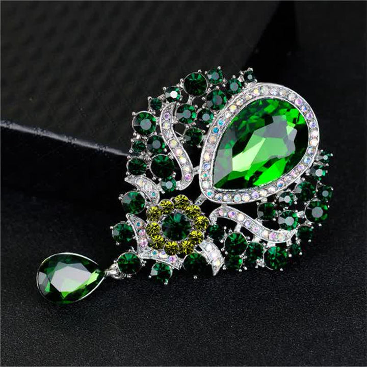 Broche en forme de goutte d'eau en verre transparent pour femme