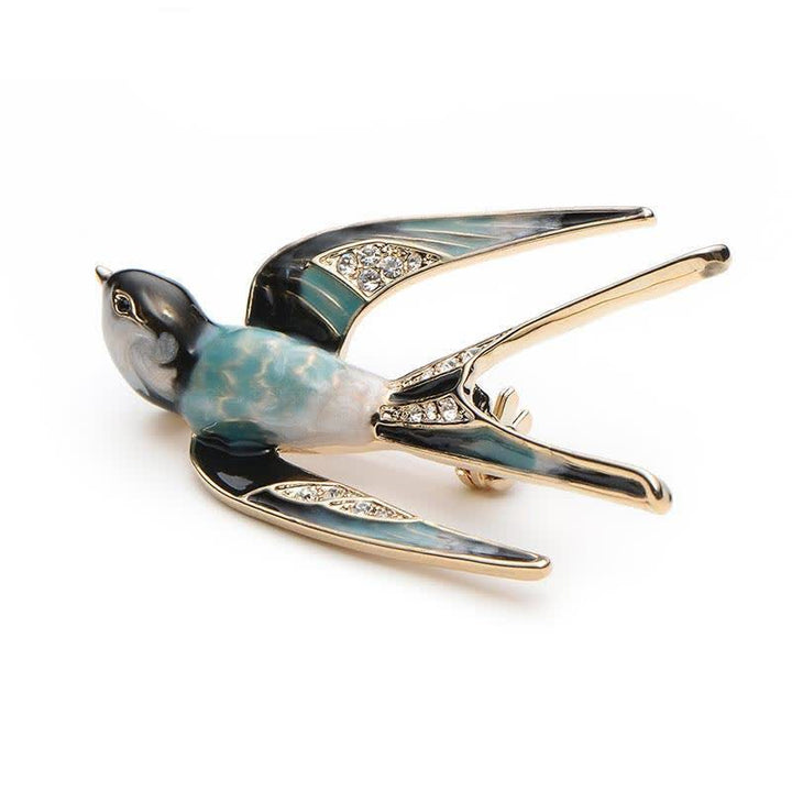Jolie broche hirondelle en émail pour femme