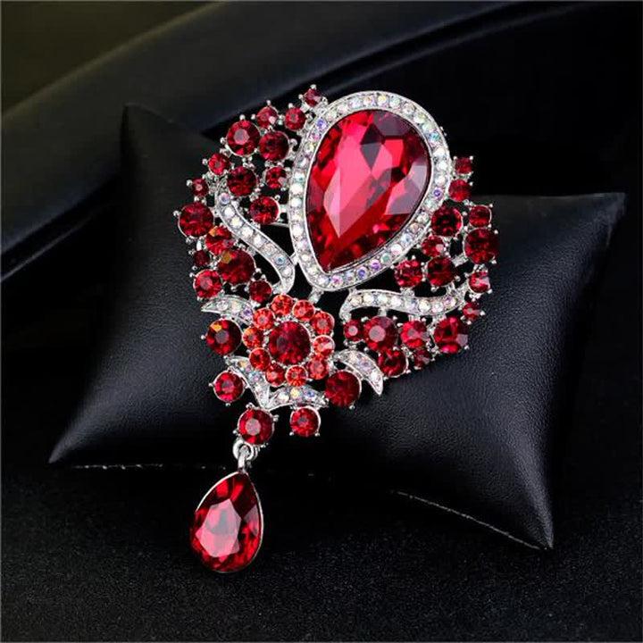 Broche en forme de goutte d'eau en verre transparent pour femme