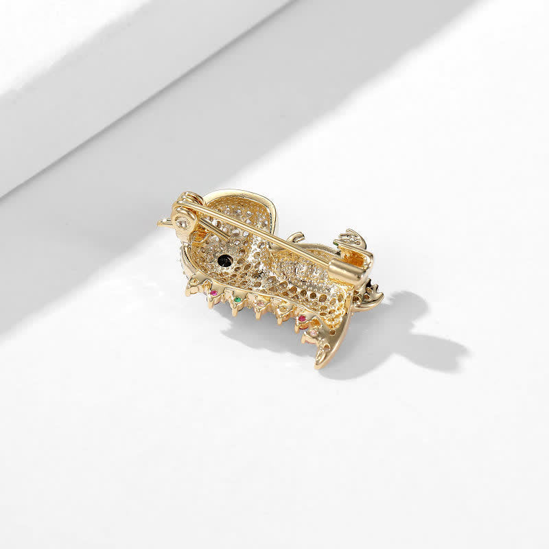 Broche de dinosaure scintillante pour femme