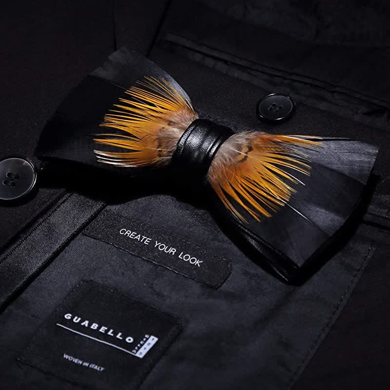 Nœud papillon en plumes de tournesol orange et noir avec épingle à revers