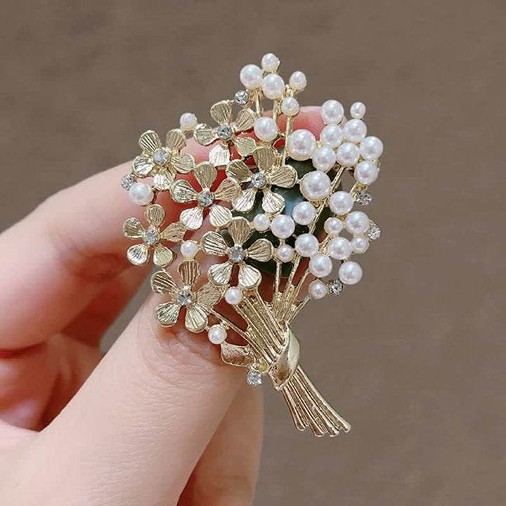 Broche pour femme en perles et fleurs dorées