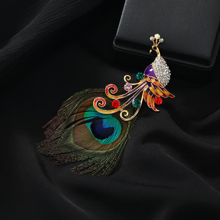 Broche ethnique en plumes de paon colorées pour femme