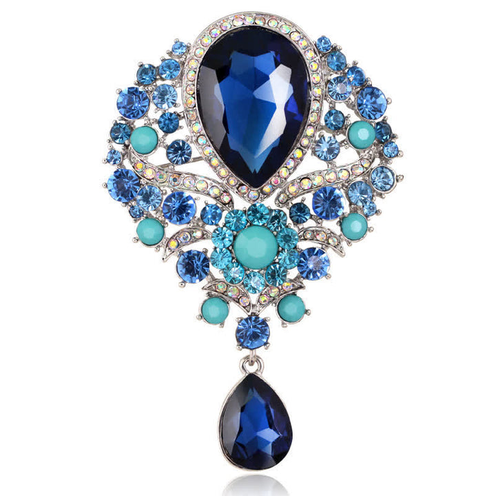 Broche en forme de goutte d'eau en verre transparent pour femme