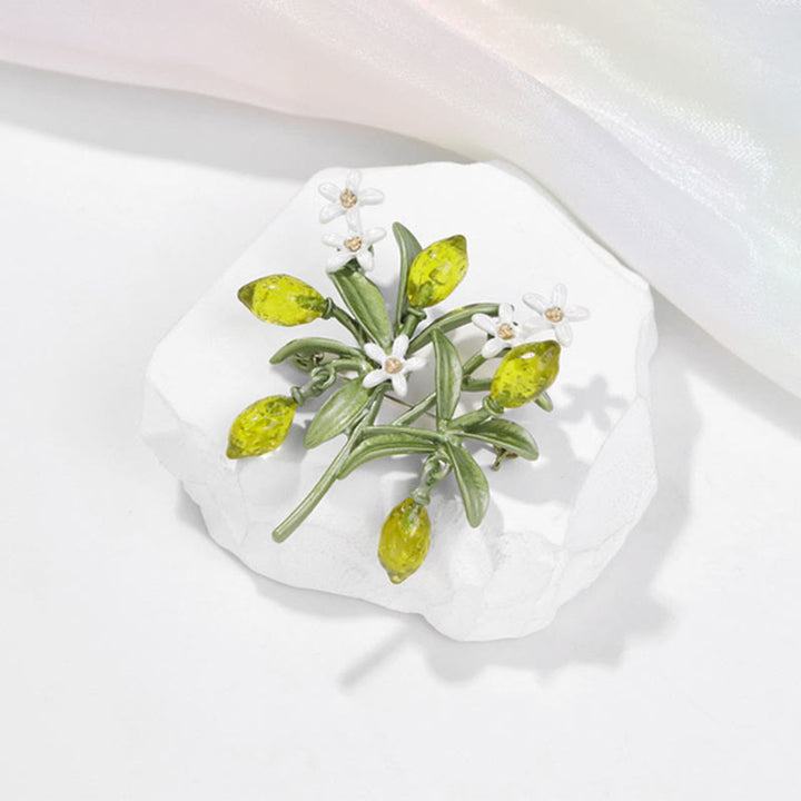 Broche pour femme en forme de goutte de citron et de plante verte
