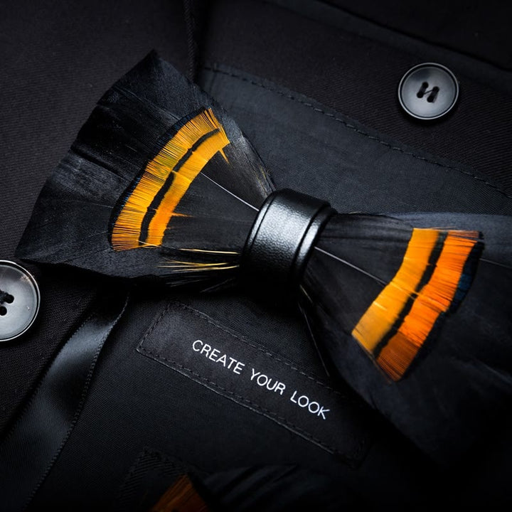 Nœud papillon en plumes de minuit noir et orange pour enfant avec épingle à revers