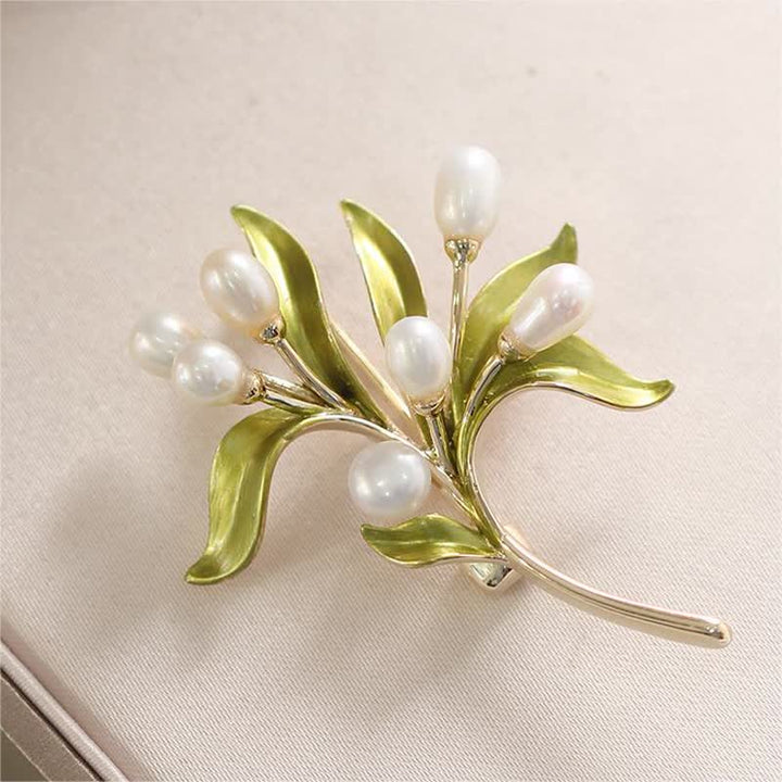 Broche pour femme en perles naturelles et rameau d'olivier