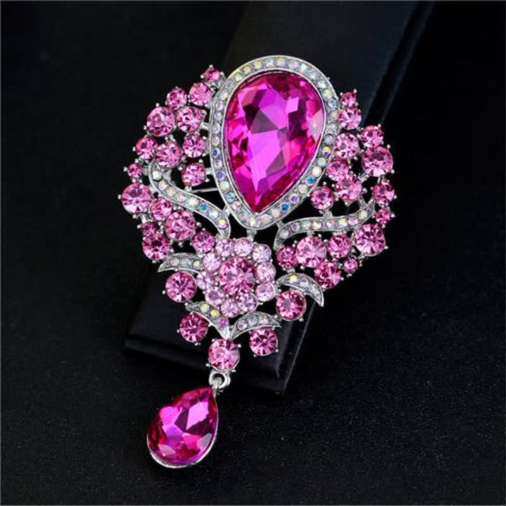 Broche en forme de goutte d'eau en verre transparent pour femme
