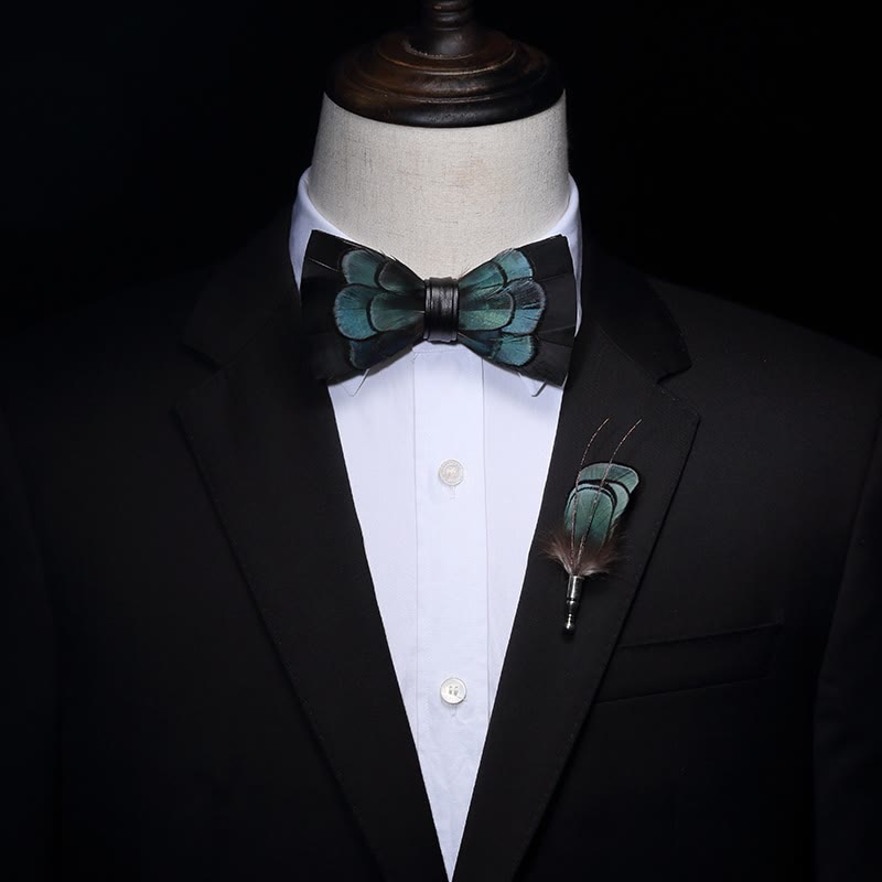 Nœud papillon en plumes noir et vert avec épingle à revers