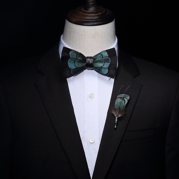 Nœud papillon en plumes noir et vert avec épingle à revers
