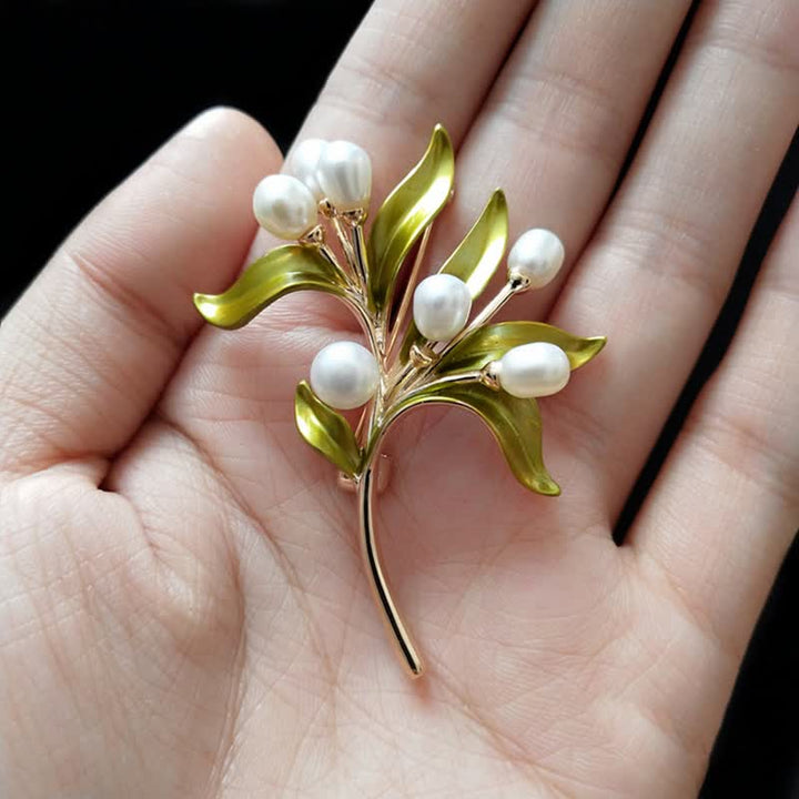 Broche pour femme en perles naturelles et rameau d'olivier