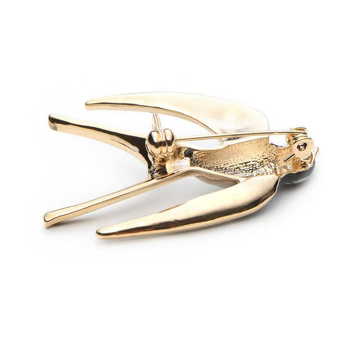 Jolie broche hirondelle en émail pour femme