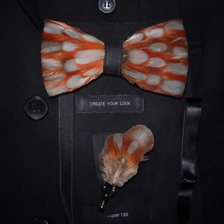 Nœud papillon en plumes orange et blanc avec épingle à revers