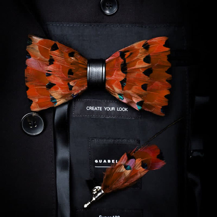 Nœud papillon en plumes de queue de pinson orange vif avec épingle à revers