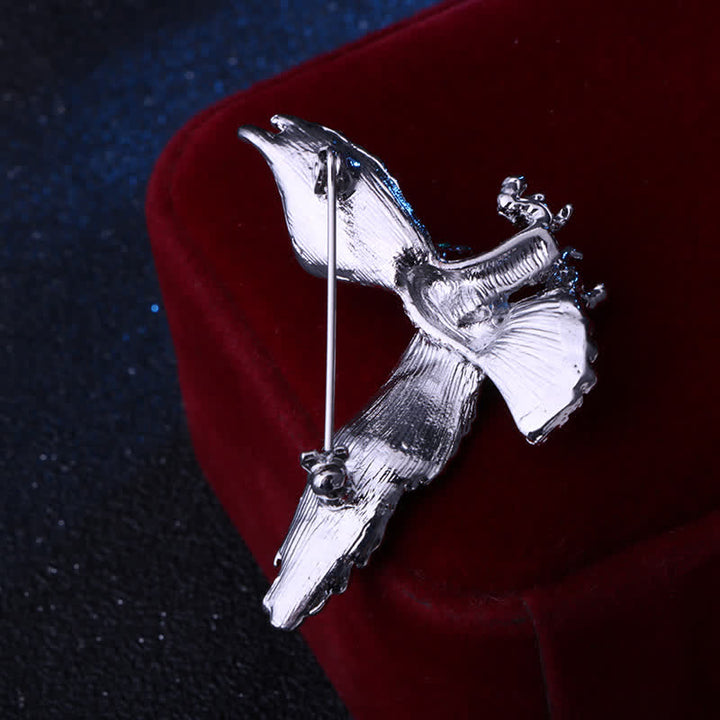 Broche œil vert pour homme avec buse chauve