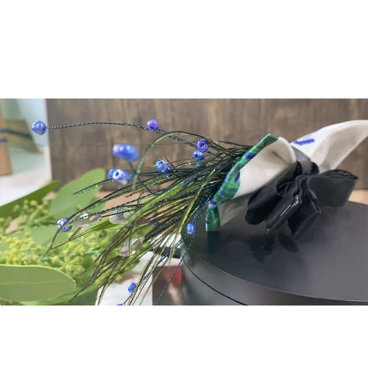 Nœud papillon en plumes et perles de paon bleu