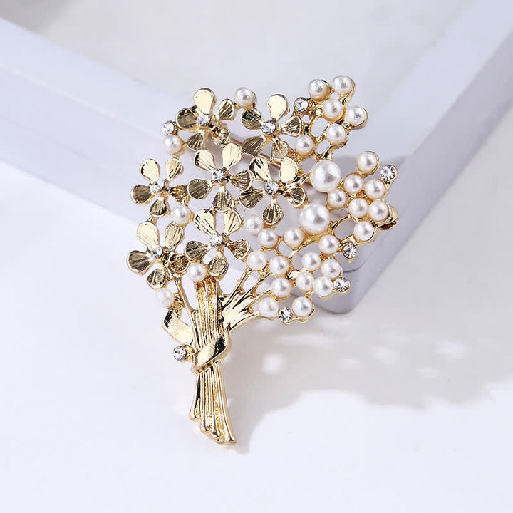 Broche pour femme en perles et fleurs dorées