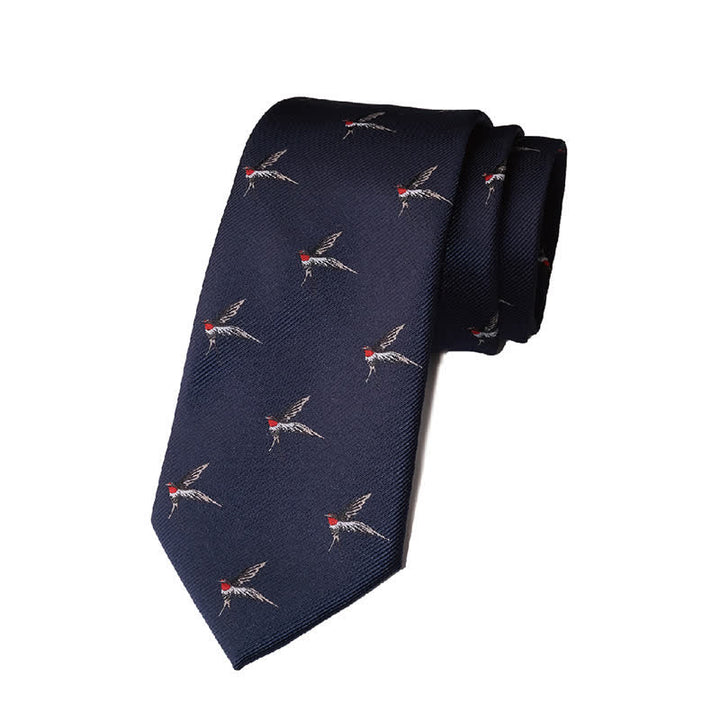 Cravate tissée brodée bleu marine pour homme avec motif hirondelle