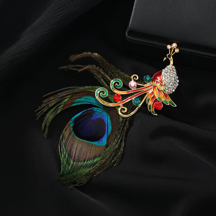 Broche ethnique en plumes de paon colorées pour femme