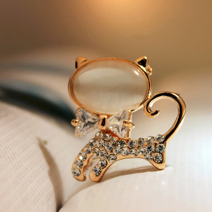 Broche pour femme en forme de chat opale avec noeud papillon