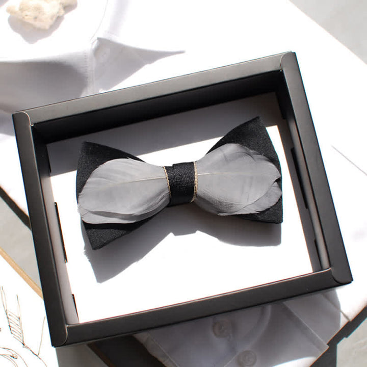 Nœud papillon en velours gris et noir avec plumes