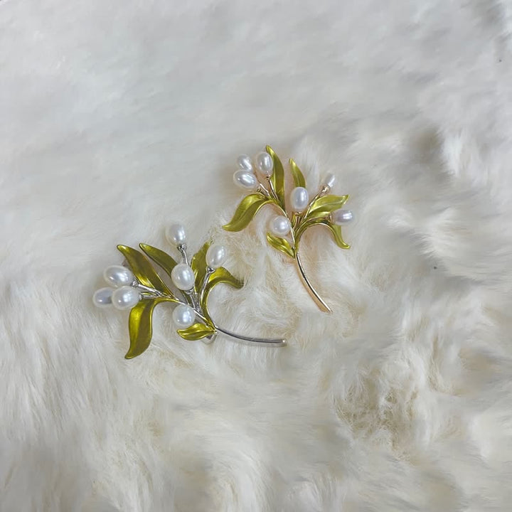 Broche pour femme en perles naturelles et rameau d'olivier