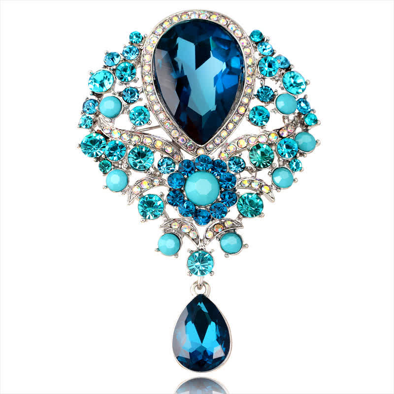 Broche en forme de goutte d'eau en verre transparent pour femme