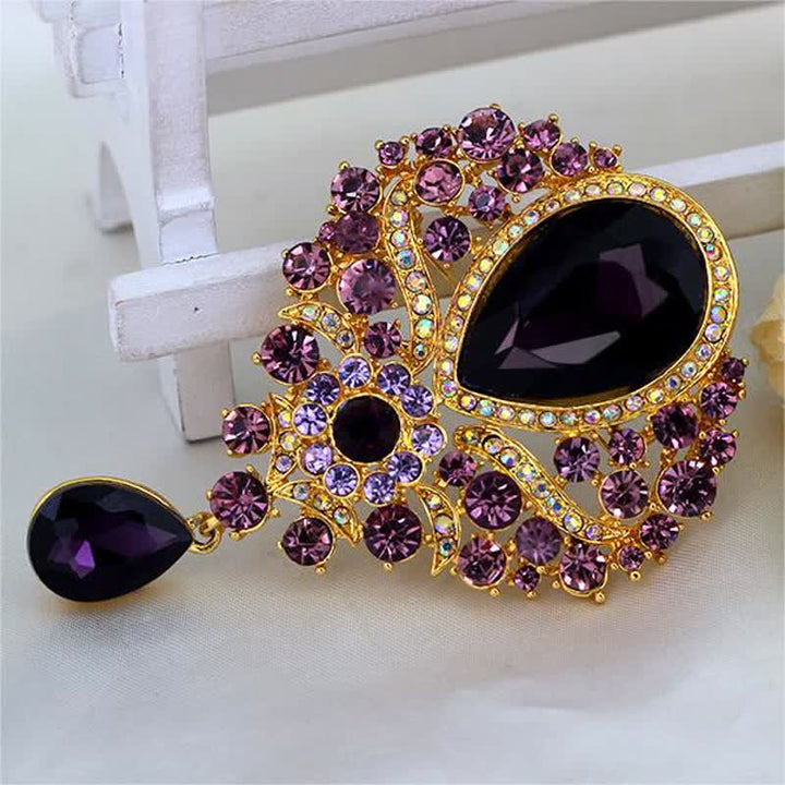 Broche en forme de goutte d'eau en verre transparent pour femme
